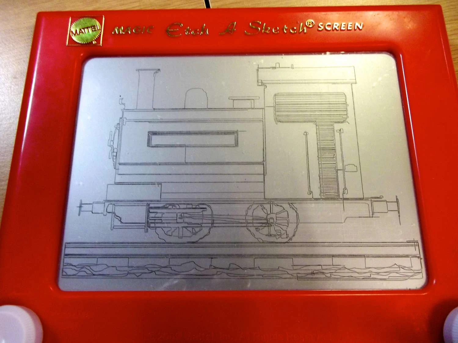 تصویری از یک اسباب‌بازی Etch-a-Sketch